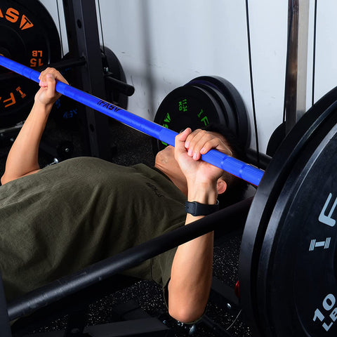 bench press with blue barbell 